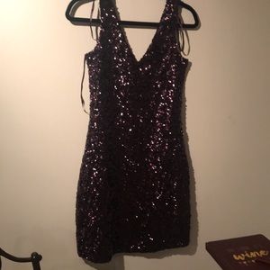 Sparkly, fun, sexy, knee length dress,